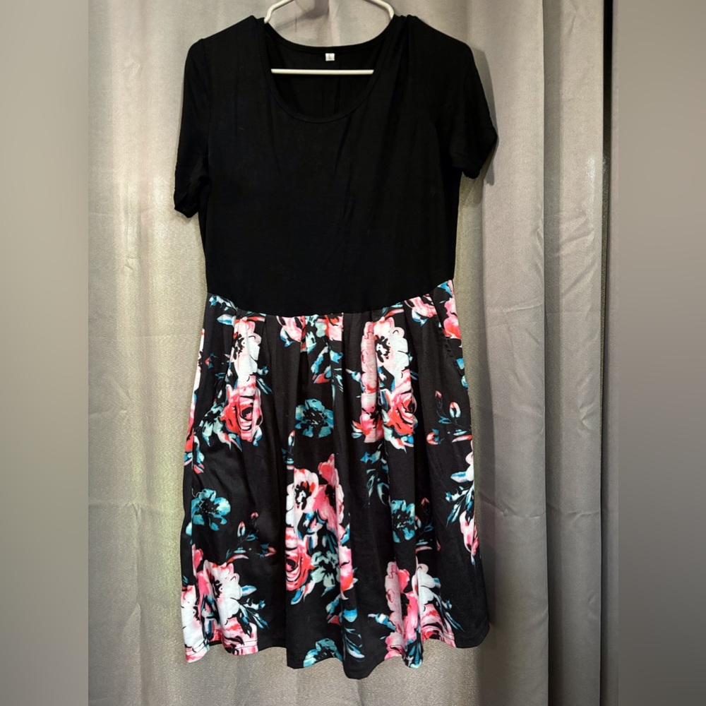 Black dress with floral skirt size large black floral excellent condition